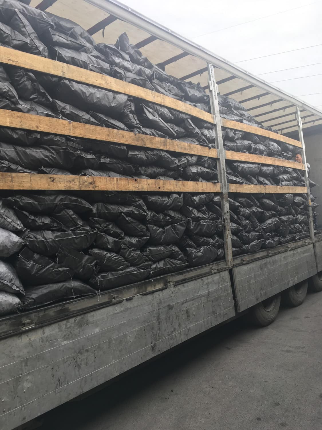 Truck loaded with bagged charcoal