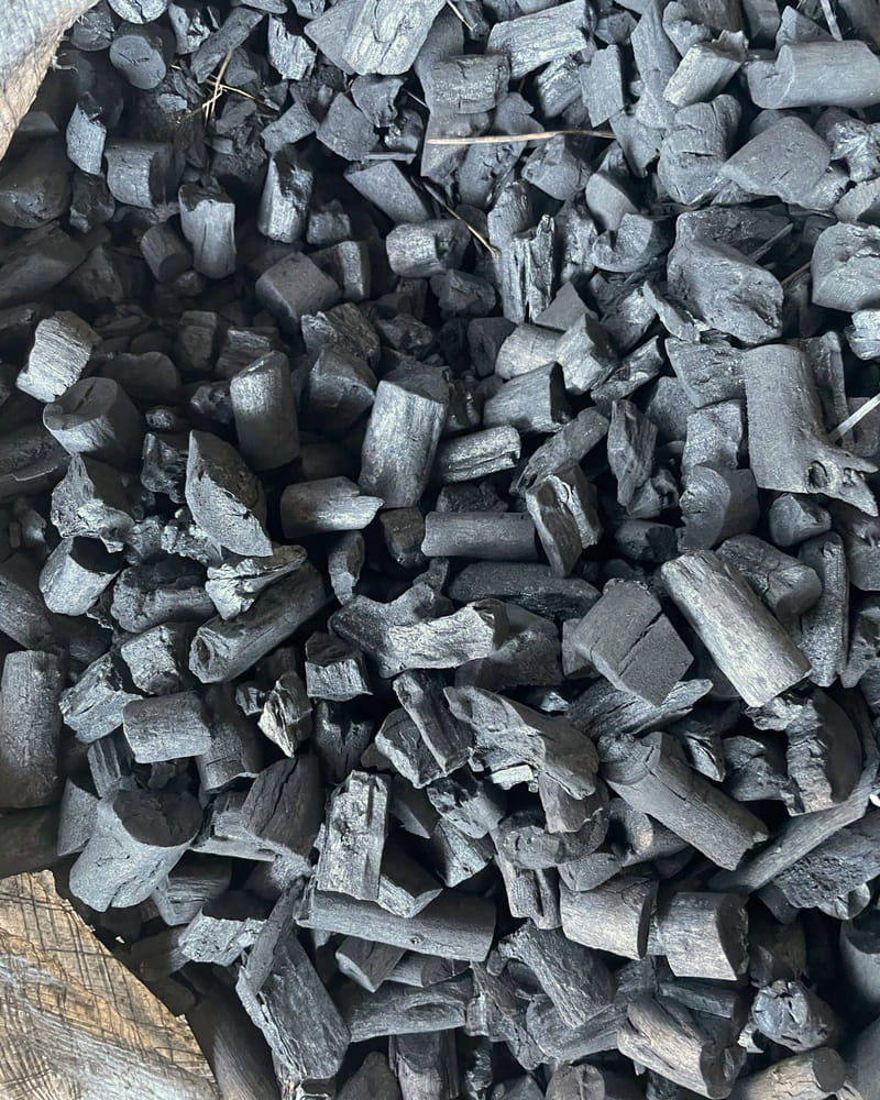 Assorted hardwood lump charcoal in a bulk sack