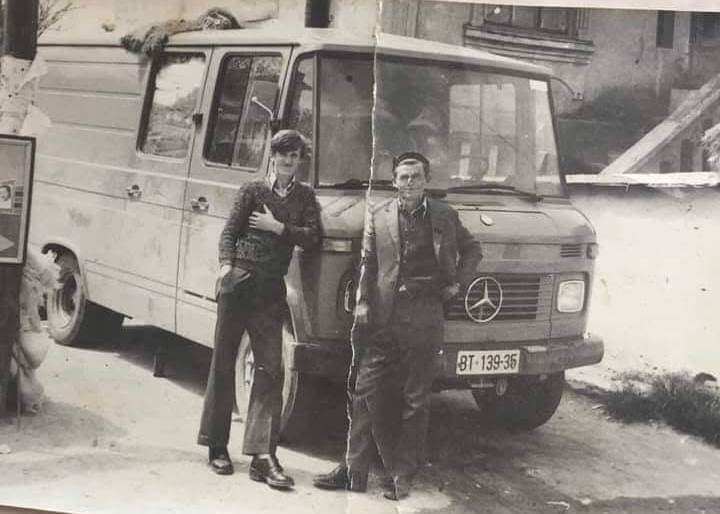 A young Goce Nikoloski with his father, and the first van — around 1990