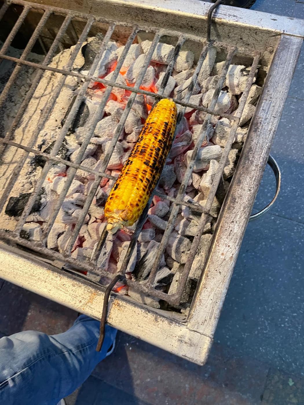 Corn roasting over live charcoal